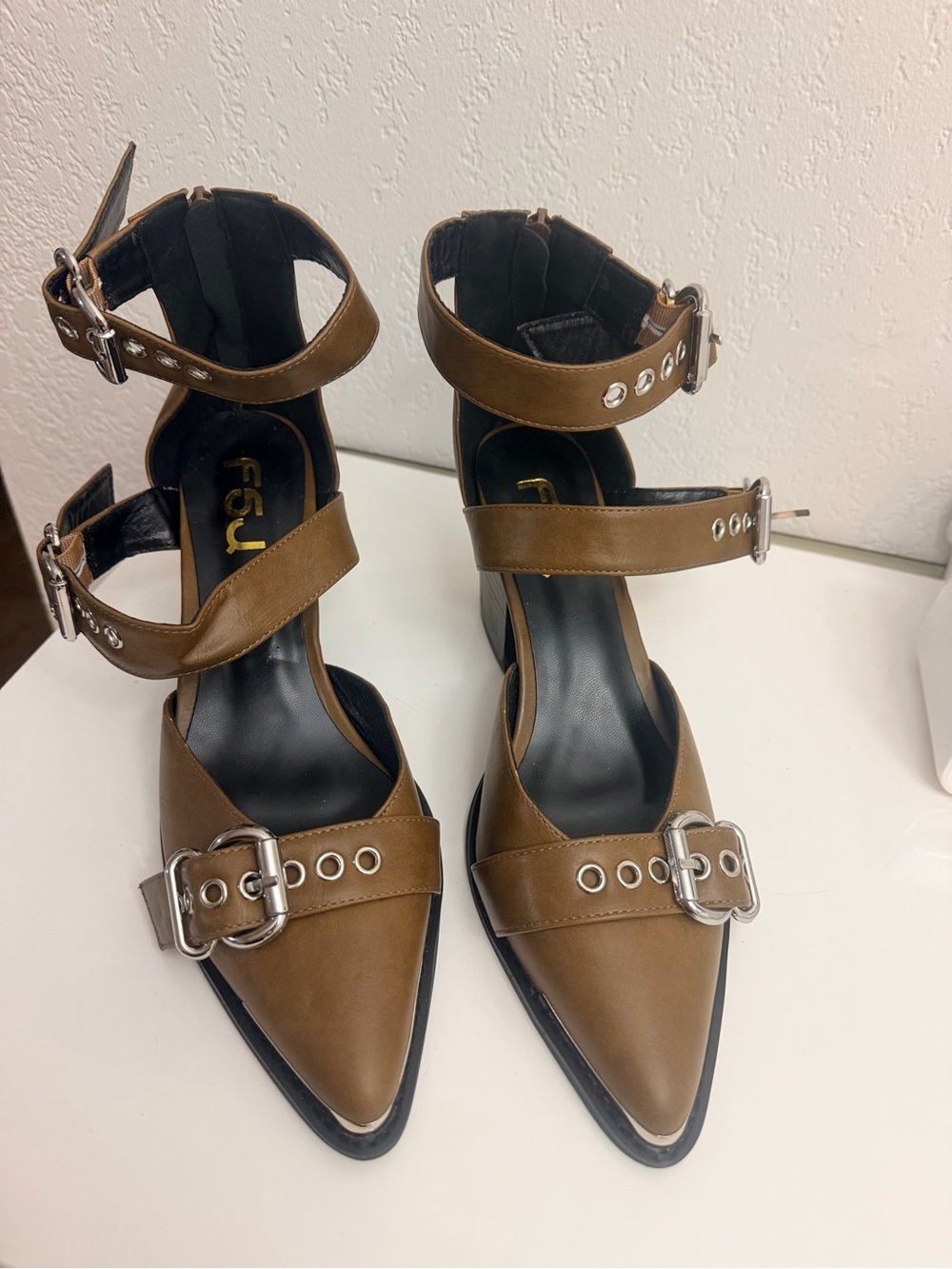 Wedge heeled sandals with straps
